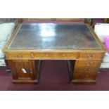 A late 19th/early 20th century Maple & co mahogany partners pedestal desk with leather skiver, H.