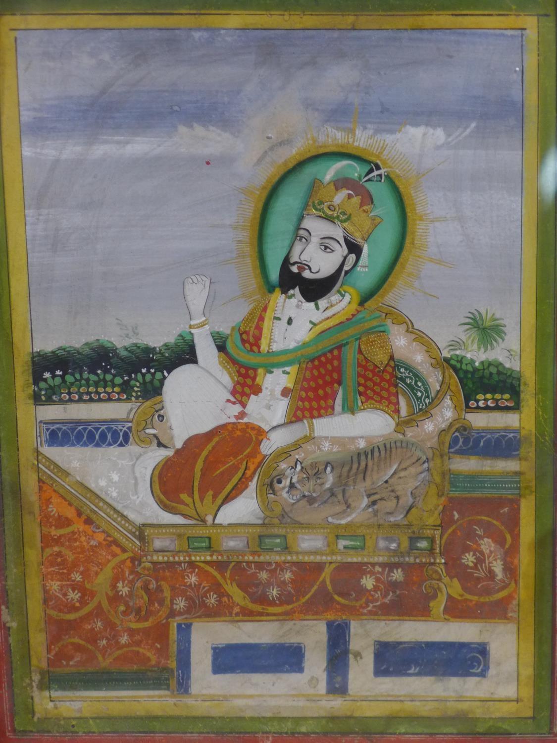 A 17th/18th century Rajput gouache painting of a nobleman on a throne with tiger, 22 x 17cm