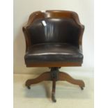 A late 19th/early 20th century Globe Wernicke mahogany captains swivel desk chair