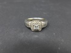 An Art Deco style 14ct white gold and diamond cluster ring, size N 1/2