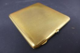 A French gold cigarette case, with cabochon thumbpiece, with dedication to interior, bears French