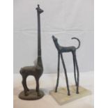 Two sculptures, to include a moulded dog, H.33cm, and a cast metal giraffe, H.48cm