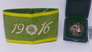 An embroidered 1916 rising armband together with a Michael Collins badge in box