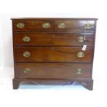 A Regency mahogany chest of 5 drawers, raised on bracket feet, H.90 W.103 D.51cm