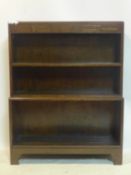 An Art Deco oak open bookcase by Minty, H.113 W.89 D.29cm