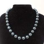A Tahitian pearl beaded necklace with silver plated and cubic zirconia set panther clasp