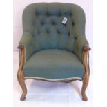 A Victorian rosewood spoon back armchair with button back upholstery, raised on cabriole legs