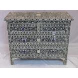 A modern bone inlaid ebony chest of 2 short over 2 long drawers, raised on square feet, H.88 W.107