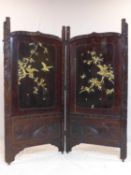 A late 19th/early 20th century Japanese 2 fold lacquered screen, with carved bone inlay