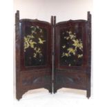 A late 19th/early 20th century Japanese 2 fold lacquered screen, with carved bone inlay