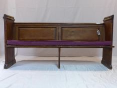 A pine church pew, H.96 W.188 D.60cm