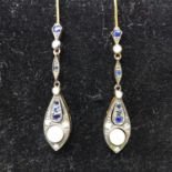 A pair of Edwardian style drop earrings set with diamonds, pearls and sapphires