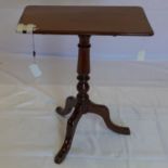 A 19th century mahogany tilt top table, raised on turned support and 3 splayed legs, H.71 W.61 D.