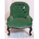 A Victorian spoon back chair with button back velour upholstery, raised on cabriole legs