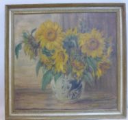 Rolf Rutmens (20th century Dutch school), Still life study of sunflowers in a blue and white Delft