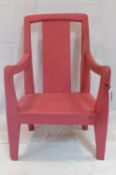 A large 20th century red painted armchair