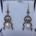 A pair of pearl and diamond drop earrings, boxed