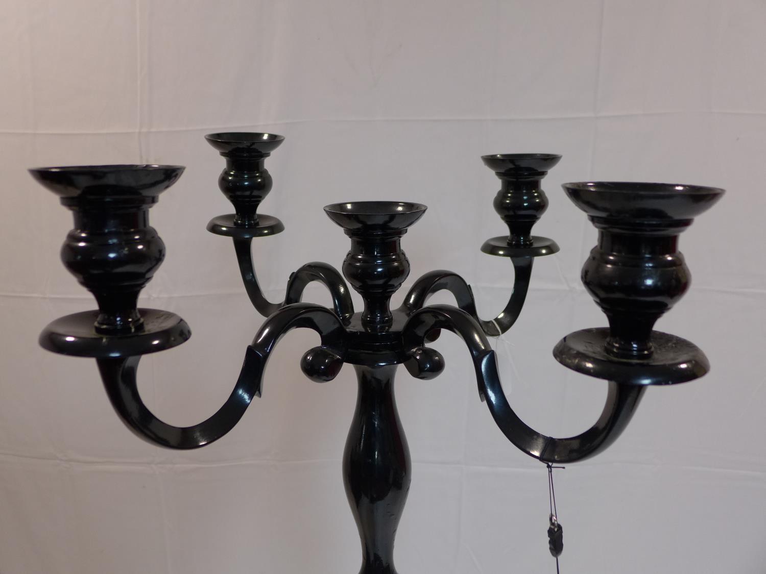 A contemporary floor standing black painted metal candelabra, H.155cm - Image 2 of 2