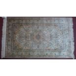 A 20th century Turkish pure silk Hereke rug with Aubusson design, 150 x 92cm