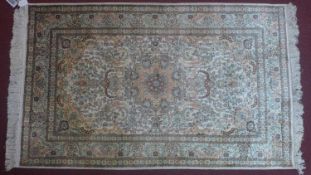 A 20th century Turkish pure silk Hereke rug with Aubusson design, 150 x 92cm