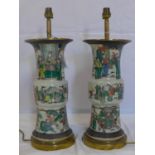 A pair of 19th century Chinese crackle glazed vases, hand painted with figures in courtyard