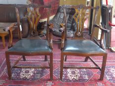 A pair of Georgian style mahogany carver armchairs