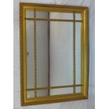 A Regency style gilt wood sectional mirror, 136 x 100cm