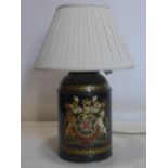 A 19th tole ware tea caddy hand painted with armorial crest, converted to a lamp, H.36cm