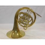 A Paxman 'Studenti' brass French horn with fitted carry case