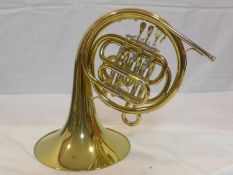 A Paxman 'Studenti' brass French horn with fitted carry case