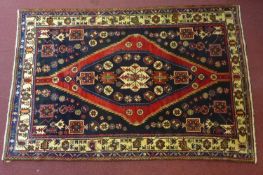 A North-West Persian Zanjan rug, central double pendent medallion with repeating petal motifs on a