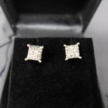 A pair of white gold and diamond stud earrings, approx. 1ct total