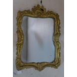 A Rococo style gilt plaster mirror, plate is loose, 58 x 40cm