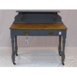 An early 20th century painted clerks desk, with superstructure over 2 drawers, raised on turned legs