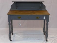 An early 20th century painted clerks desk, with superstructure over 2 drawers, raised on turned legs