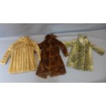 Two vintage fur jackets together with a faux cheetah fur jacket