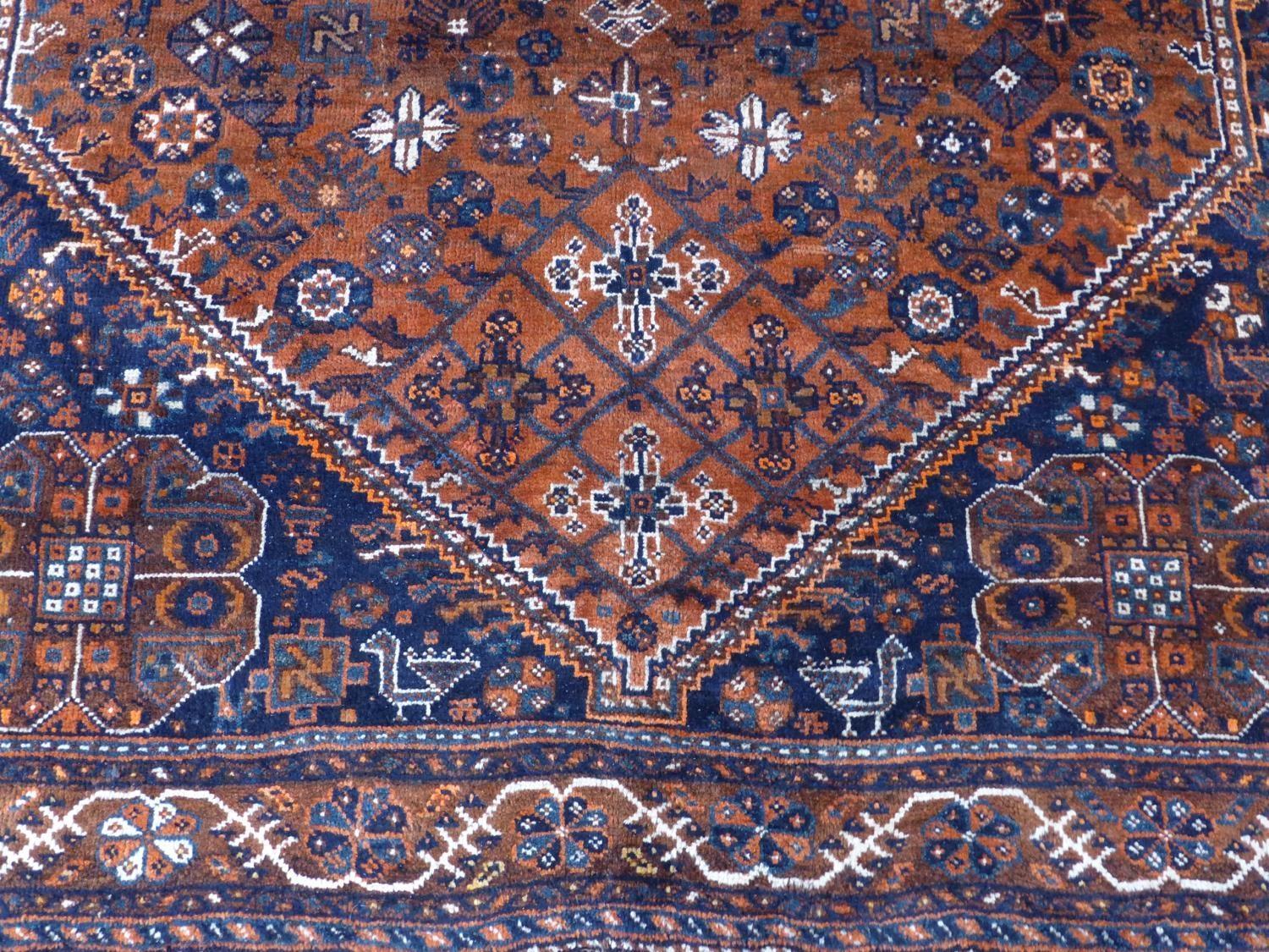 A South-West Persian Qashqai carpet, central diamond medallion with repeating petal and animal - Image 4 of 5