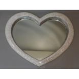 A contemporary wall mirror in the shape of a heart, 92 x 110cm