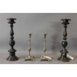 A pair of cast metal pricket sticks, H.36cm, together with a pair of silver plated candlesticks, H.