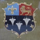 A framed embroidery of Eton College armorial crest, 44 x 47cm (frame), 30 x 27cm (crest), back is
