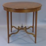 A late 19th century circular mahogany centre table with satinwood cross banding, H.71 D.76cm