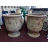 Two large terracotta vases, one with repaired damage, H.69cm Diameter 60cm