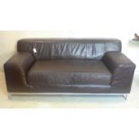 A contemporary leather 2 seater sofa