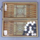 A micro mosaic games board, with chess and backgammon