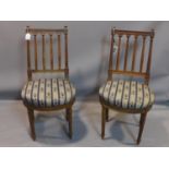 A pair of late 19th century French oak chairs