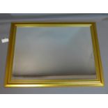 A large contemporary gilt mirror, with bevelled plate, 91 x 117cm