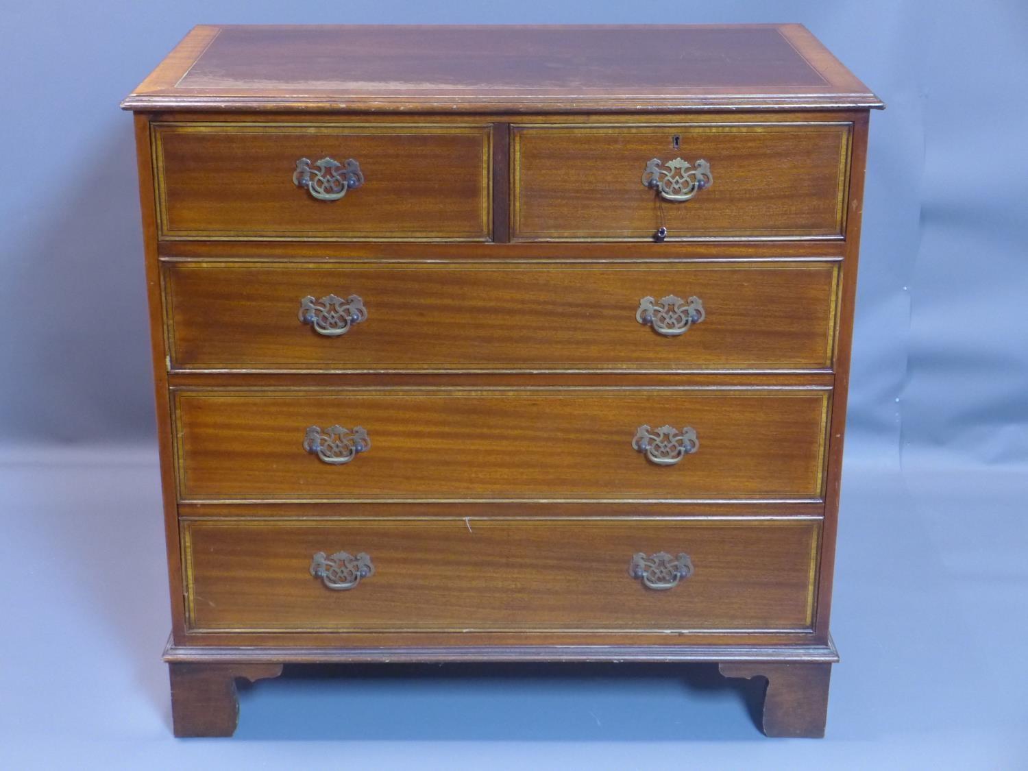 A Georgian style mahogany chest of 2 short over 3 long drawers, stamped Nissenbaum & Sons Ltd., H.93