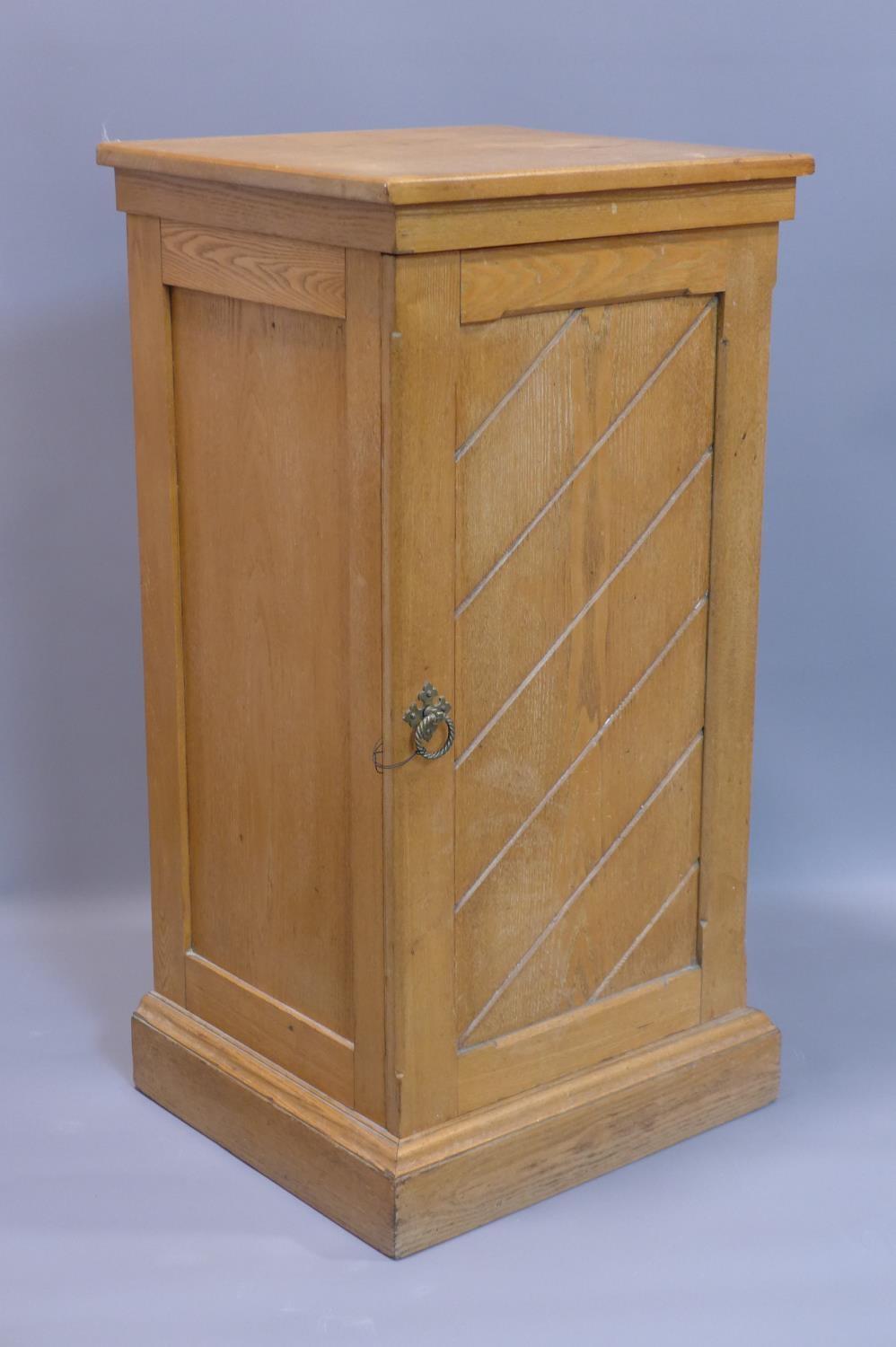 A 20th century oak pedestal cabinet, H.87 W.45 D.41cm