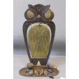 An Art Nouveau brass and iron gong modelled as an owl, marked , --Hammer is missing--