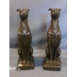 A pair of terracotta seated greyhounds, H.80cm